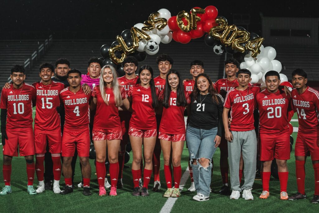 Kilgore High School's boys and girls senior classes of 2024 posed for this photo between games against New Diana Friday night, Jan. 26, here at R.E. St. John Memorial Stadium. The KHS teams swept New Diana, and both visit Tenaha on Tuesday. (Photo by ALEX NABOR - ETBLITZ.COM)