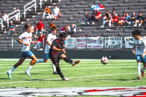 Kilgore's Jerson Avelar Flores (23) takes a shot on goal against Sabine Saturday morning at R.E. St. John Memorial Stadium in Kilgore. The Bulldogs beat Sabine, 2-0, but it was super close, as Kilgore scored twice in the final 8:10 of the game in District 15-4A play. (Photo by ALEX NABOR - ETBLITZ.COM)