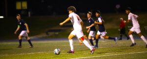 Kilgore senior Leo Yzaguirre (6, foreground) scored a solo goal and had an assist in this game Tuesday night at New Diana. Kilgore won, 7-0, and prior to that, the Lady Bulldogs also won, 7-0. (Photo by JOVANNY CERVANTES - Special to ETBLITZ.COM)