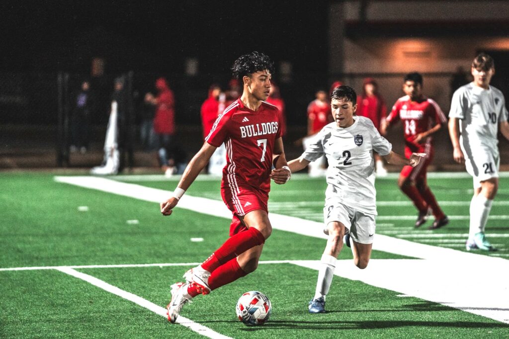 Adan Reyes (7) controls the ball. Reyes is the most recent Whataburger / ETBlitz.com Boys Player of the Week for three goals scored against Tatum (for the week of Feb. 12-16). He's joined by Carol Anguiano of Sabine, the Lady Cardinals' goalkeeper who passed the 100-save mark earlier this season (below). (Photo by ALEX NABOR - ETBLITZ.COM)