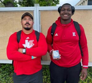 Kilgore senior Braydon Nelson (right) is all smiles here beside coach Josh Lyons after a second-place finish in discus at the Clyde Littlefield Texas Relays at the University of Texas in Austin on Friday. Nelson was one of a handful of ETBlitz-area athletes in the event; some, like Troup's Trae Davis, also had great finishes. Davis was seventh in the long jump. (Photo courtesy of KILGORE HIGH TRACK & FIELD)