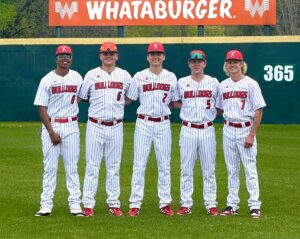 Kilgore seniors (from left) Jordan Pierce, Tate Truman, Aiden Domorad, Todd House and Cade Henry were honored before Friday's home game against Gilmer at Driller Park, and then the Diamond 'Dogs beat the Buckeyes, 14-0. Kilgore Boys Baseball Association players also got to come onto the field with the Bulldogs' starters before the game, because it was KBBA night at the park, as well. Kilgore hosts Henderson on Tuesday. (Photo courtesy of LORI TRUMAN - Special to ETBLITZ.COM)