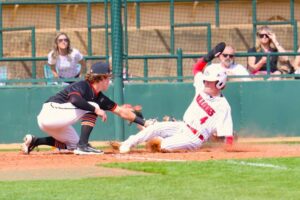 Kilgore's Tanner Beets slides safely under a tag to score against Gilmer in a game earlier this season. Henderson defeated Kilgore Thursday night, 5-3, and then Kilgore returned the favor on Friday, beating the Lions, 14-7, in Henderson. (Photo by DENNIS JACOBS - ETBLITZ.COM)