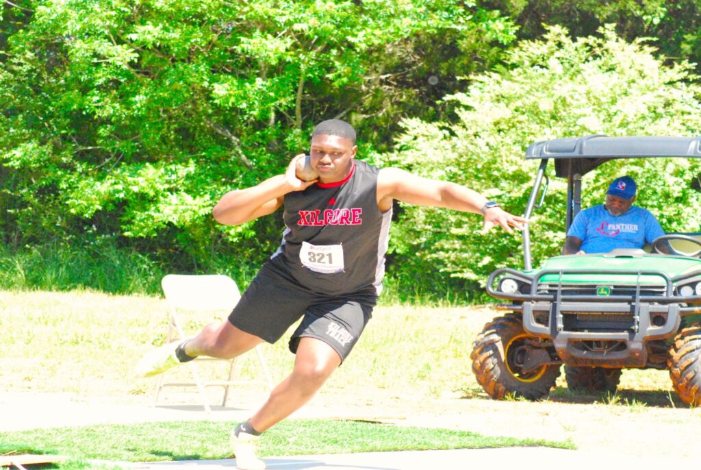 Kilgore senior Braydon Nelson in the shot put on Monday near Bullard ISD Panther Stadium. Nelson won both the shot and the discus at the regional meet, and is headed to the UIL state meet May 2-4 at the University of Texas in Austin. Kilgore's Jacory Walton (inset) is going to Austin in the high jump. (Photo above by MITCH LUCAS, ETBLITZ.COM; photo below courtesy of Kilgore coach NICK SANDERS)
