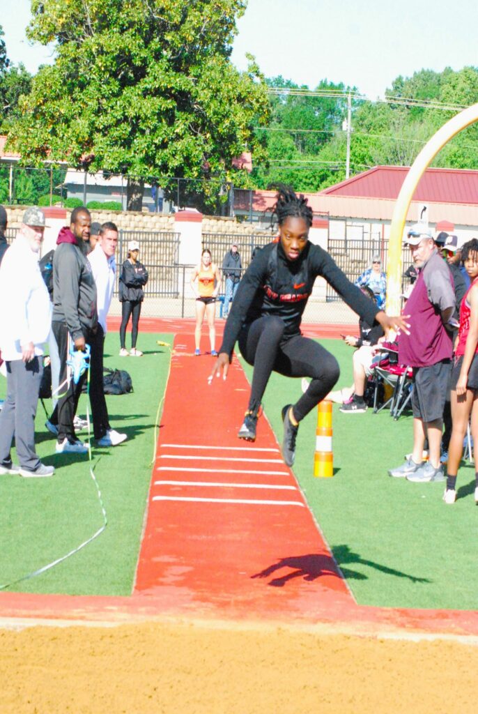 Peyton Hunter did it all for Gladewater Thursday at the area track meet at West Rusk. Hunter won the girls 100 meter dash, was second in the long jump and third in the triple jump. She also helped the Lady Bears win the 400 and the 800 meter relays! Here, she's pictured competing in the triple jump (Photo by MITCH LUCAS - ETBLITZ.COM)