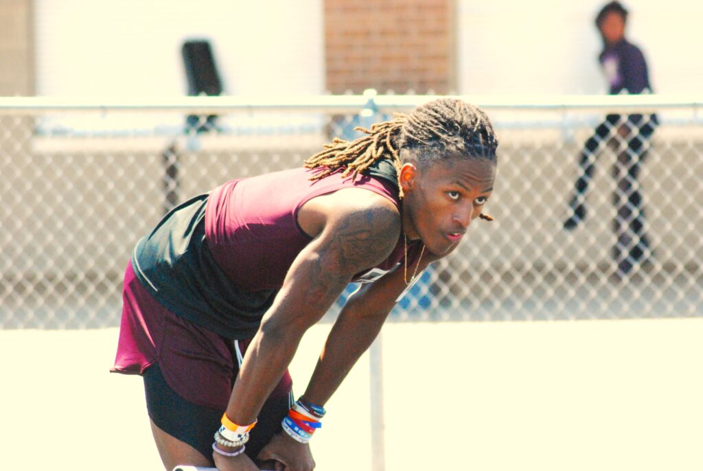 Troup High School senior Trae Davis (above) is headed to the UIL State Track & Field Championships in four different events after an unbelievable performance at the Region II meet in Whitehouse on Friday and Monday. Davis was just one of several fantastic student athletes who put their skills on display, though. (Photo by MITCH LUCAS - ETBLITZ.COM)