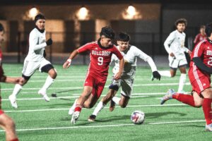 Kilgore High School senior soccer standout Diego Rojas (above, 9) was named the most valuable player of District 15-4A, as a part of the all-district team, voted on by the district's coaches recently. Below: Leo Yzaguirre, voted as co-utility player of the year. Yzaguirre and teammate Jose Vasquez, also a member of the all-district team, were also voted as members of the UIL State All-Tournament Team by members of the Texas Association of Soccer Coaches during the Bulldogs' state tournament run. (Photo above by ALEX NABOR - ETBLITZ.COM; Photo below courtesy of the UNIVERSITY INTERSCHOLASTIC LEAGUE)