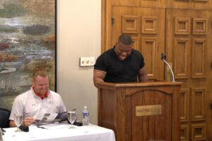 Kilgore College head football coach Willie Gooden (right) and Navarro head coach Ryan Taylor laughed, along with the rest of the media in the room, as the "X-Files" theme played (someone's ring tone) when Gooden approached the podium Thursday at SWJCFC Media Day at Hollytree Country Club in Tyler. "That's about right," one coach laughed, and Gooden owned the next 10 minutes, as he normally does when he speaks. It's moments like this that make working in sports fun -- the "toy department of life," as ETBlitz.com editor/publisher Mitch Lucas calls it. (ETBLITZ.COM PHOTO)