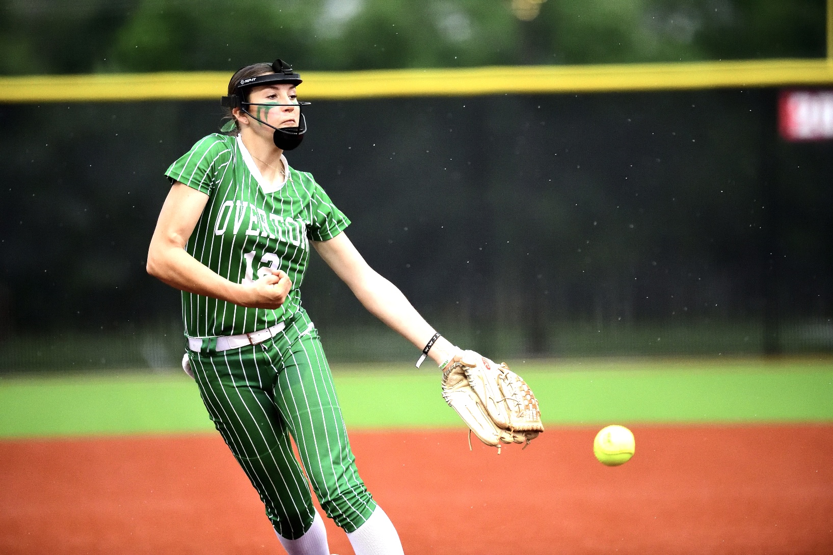 Overton's Kelsey Vaught delivers a pitch to the plate against Martin's Mill at Tyler Legacy's field during a bit of a rain in a UIL Class 2A bi-district softball game on Friday, April 26. Overton won, 12-3, advancing to the second round. (Photo by RONNIE SARTORS - SPORT SHOT PHOTOGRAPHY - ETBLITZ.COM)