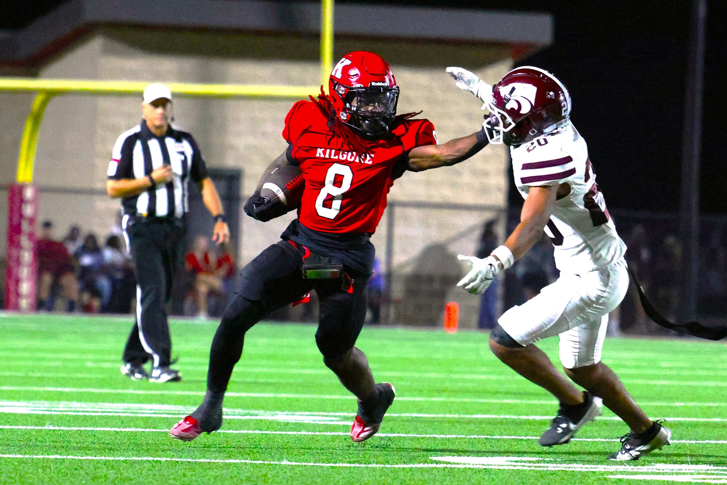 Kilgore running back Rayshaun WIlliams (8) controls a Whitehouse defender while picking up yards last week, in the Ragin' Red's 27-7 win over the Wildcats. Kilgore (2-0), ranked fifth in the Dave Campbell's Texas Football Class 4A, Division I poll, visits Gilmer (0-2), ranked sixth in the DCTF 4A-DII poll on Friday night at 7:30 at Jeff Traylor Buckeye Stadium. That's the ETBlitz.com Game of the Week. Below: Gilmer coach Alan Metzel, who led the Buckeyes to a 4A-DII state championship last year, beating Bellville at AT&T Stadium. Kilgore defeated Gilmer, 24-23, in a late comeback a year ago in Kilgore. (Photo above by DENNIS JACOBS; bottom photo by JOE HALE)