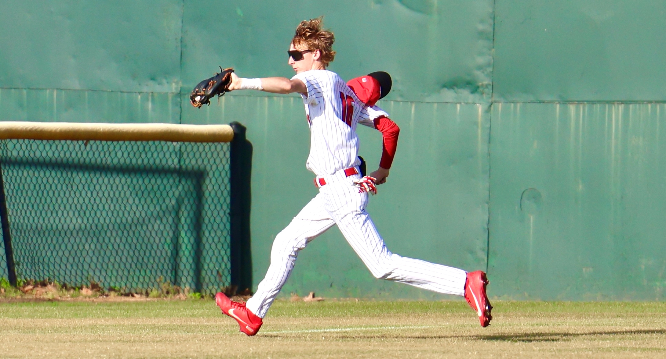 Kilgore outfielder Cason Edney makes a running catch in left field in a playoff game against Bullard. Edney was named the newcomer of the year as a part of District 17-4A's All-District Team. (Photo by DENNIS JACOBS - ETBLITZ.COM)