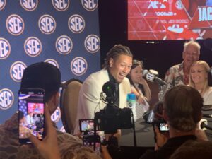 Oklahoma defensive back Billy Bowman Jr. (center) gets a hearty laugh from media members Tuesday afternoon at SEC Media Days at The Omni in Dallas. The Sooners and the Texas Longhorns both become members of the SEC this fall. (Photo by MITCH LUCAS - ETBLITZ.COM)