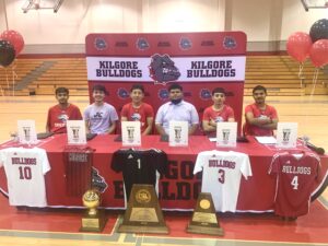 Kilgore seniors (from left) Jacob Contreras, Zachery Gutierrez, Chris Martinez, Yailenn Rojo, Jaime Vasquez and Jose Vasquez all signed letters of intent with Jacksonville College on Thursday; Gutierrez with cross country and track & field; Rojo as a manager and trainer, and the others all with JC's men's soccer program. (Photo by MITCH LUCAS - ETBLITZ.COM)