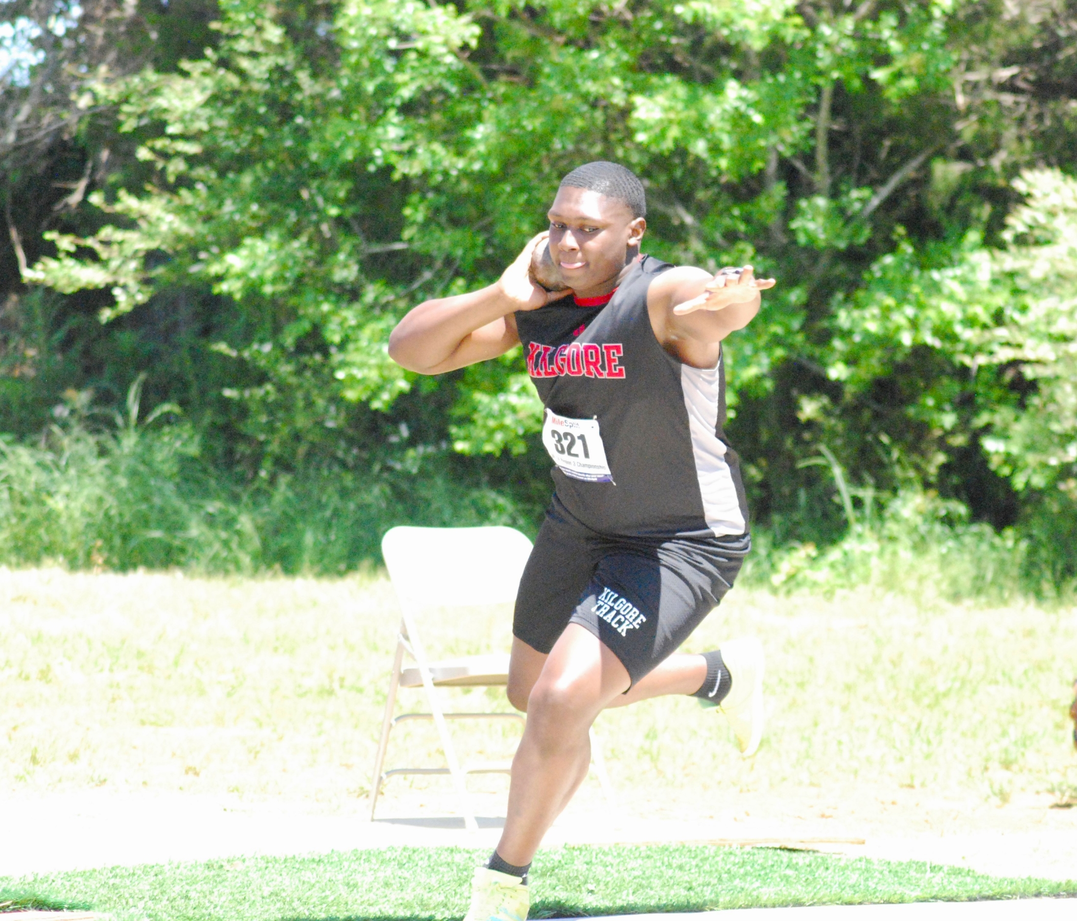 Kilgore's Braydon Nelson is in full throwing motion here in the shot put at the regional meet at Bullard. Nelson would go on to win discus at the UIL State Track & Field Championships in Austin, and finish second in the shot, and on Monday, he and Gladewater's Peyton Hunter and Paytin Thompson were named to the Texas High School Coaches Association's Super Elite Track & Field Team. (Photo by MITCH LUCAS - ETBLITZ.COM)