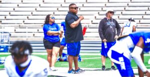 Kilgore College head football coach Willie Gooden (center) surveys the scene on the turf at R.E. St. John Memorial Stadium during the Rangers' spring game on April 27. Gooden and the other member coaches of the Southwest Junior College Football Conference will be at Hollytree Country Club in Tyler on Thursday, July 25 for the conference's annual football media day. Gooden will begin his sixth season as the Rangers' head coach when KC opens its season Aug. 24 at home against Monterrey Tech. (File photo by ALEX NABOR - ETBLITZ.COM)